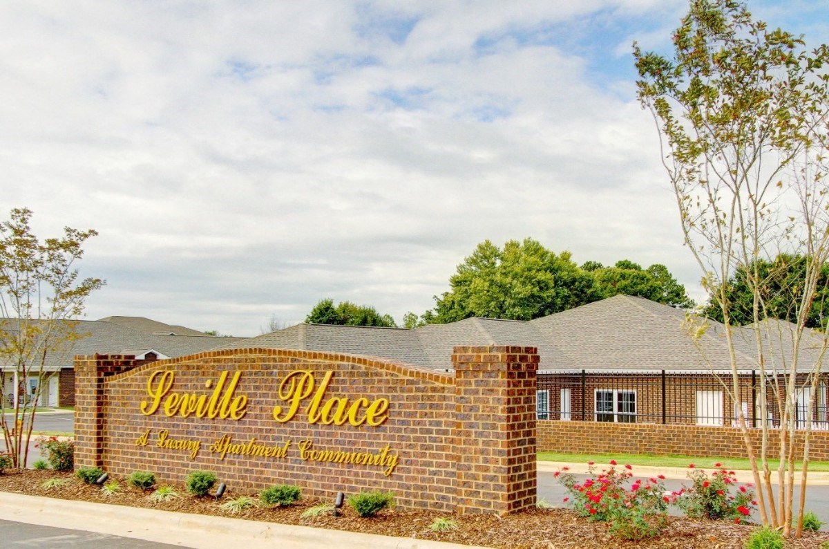 Brick monument sign at the Seville Place entrance in Florence, Alabama