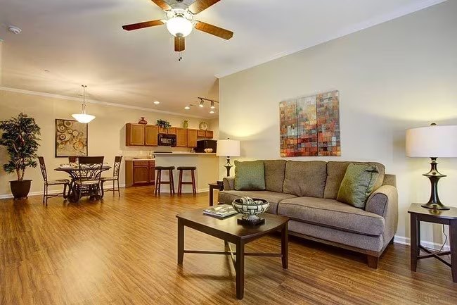 Living and dining space in a furnished Seville Place apartment